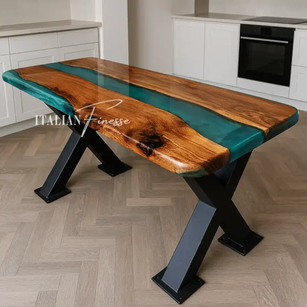 Tavolo artigianale in legno di castagno con inserti in resina epossidica verde smeraldo, gambe in ferro a X e finitura lucida, ambientato in cucina moderna.